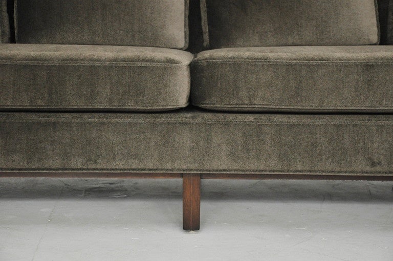 Sofa designed by Edward Wormley for Dunbar.  Newly upholstered in mohair over original finish mahogany base.
