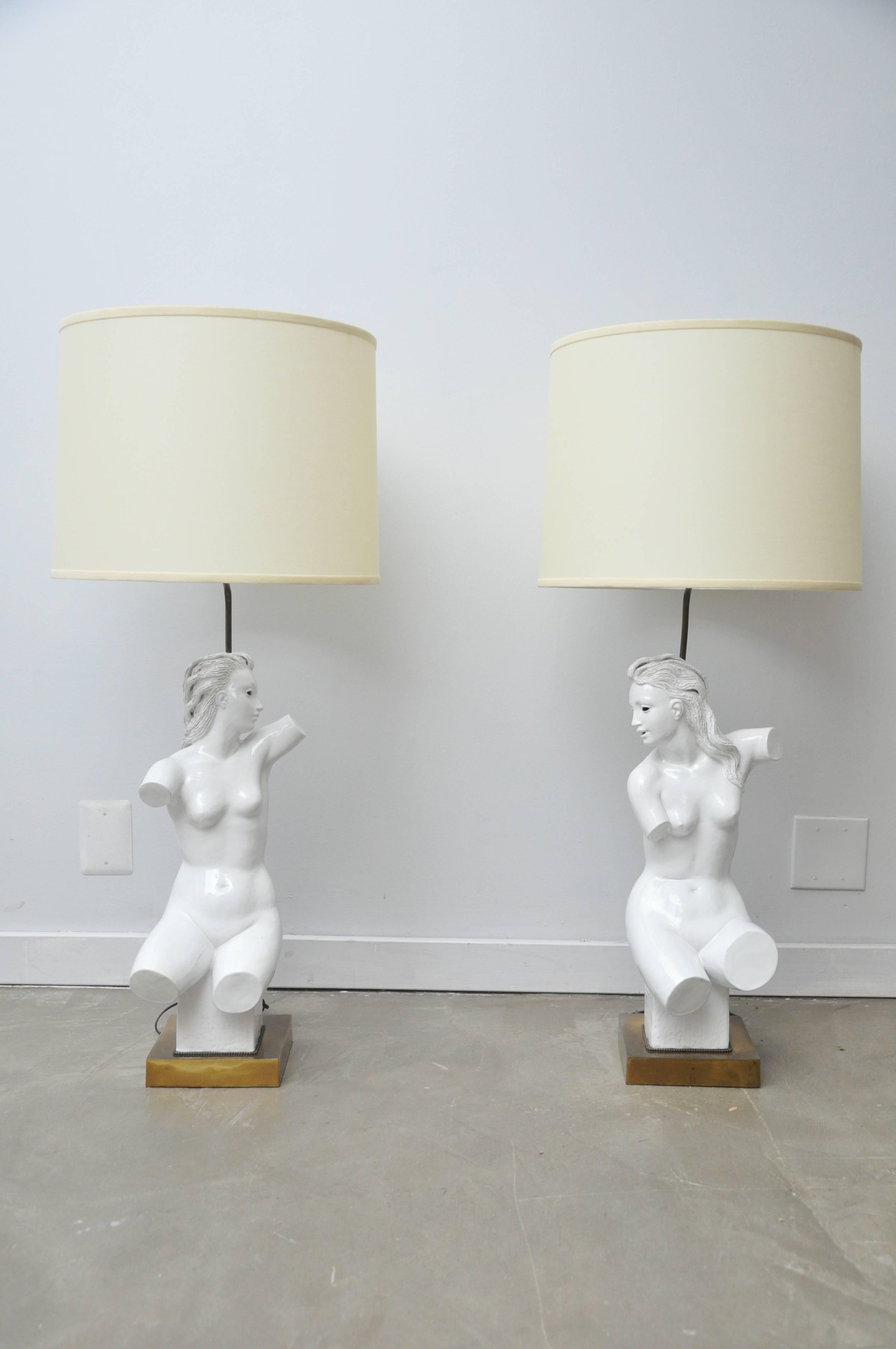 Pair of table lamps, each depicting a nude female figure
white ceramic figure on brass base, with dark silk cord
signed Zaccagnini, A 902, made in Italy. New shades.

Illustrated: 
Kelly Wearstler, Rhapsody, Rizzoli International, 2012.

 