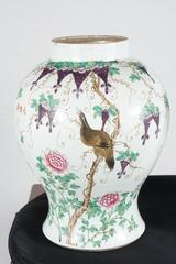 Matched pair of 20th Century Chinese Famille Rose Baluster Jars