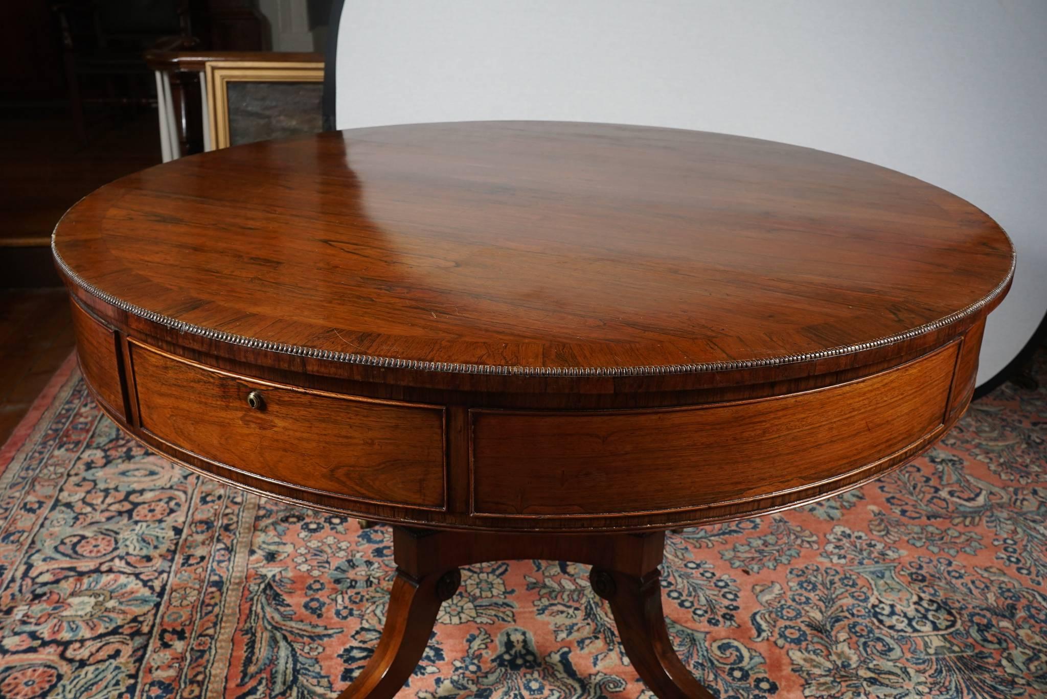 English 19th Century Regency Rosewood Drum Table For Sale