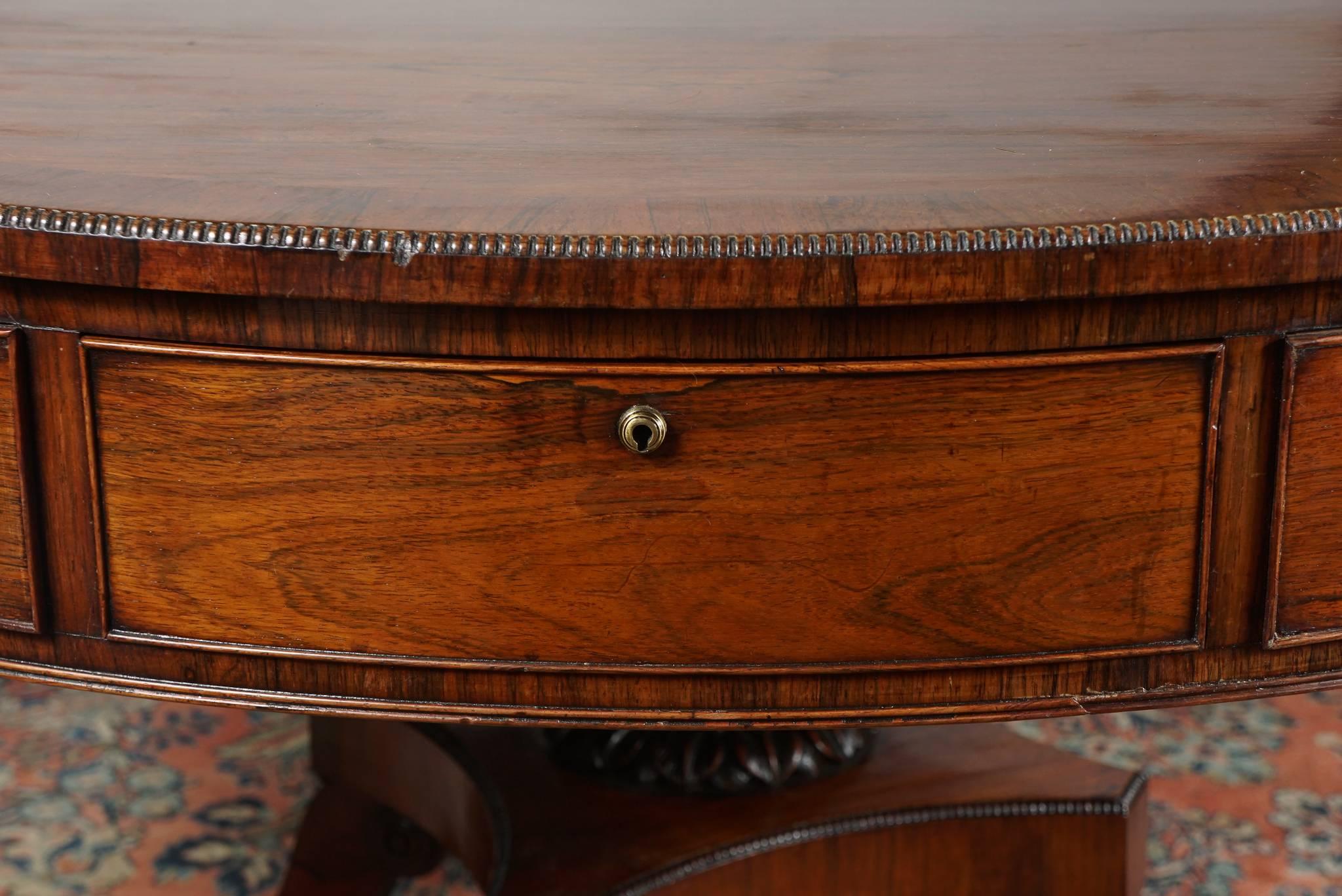 Carved 19th Century Regency Rosewood Drum Table For Sale