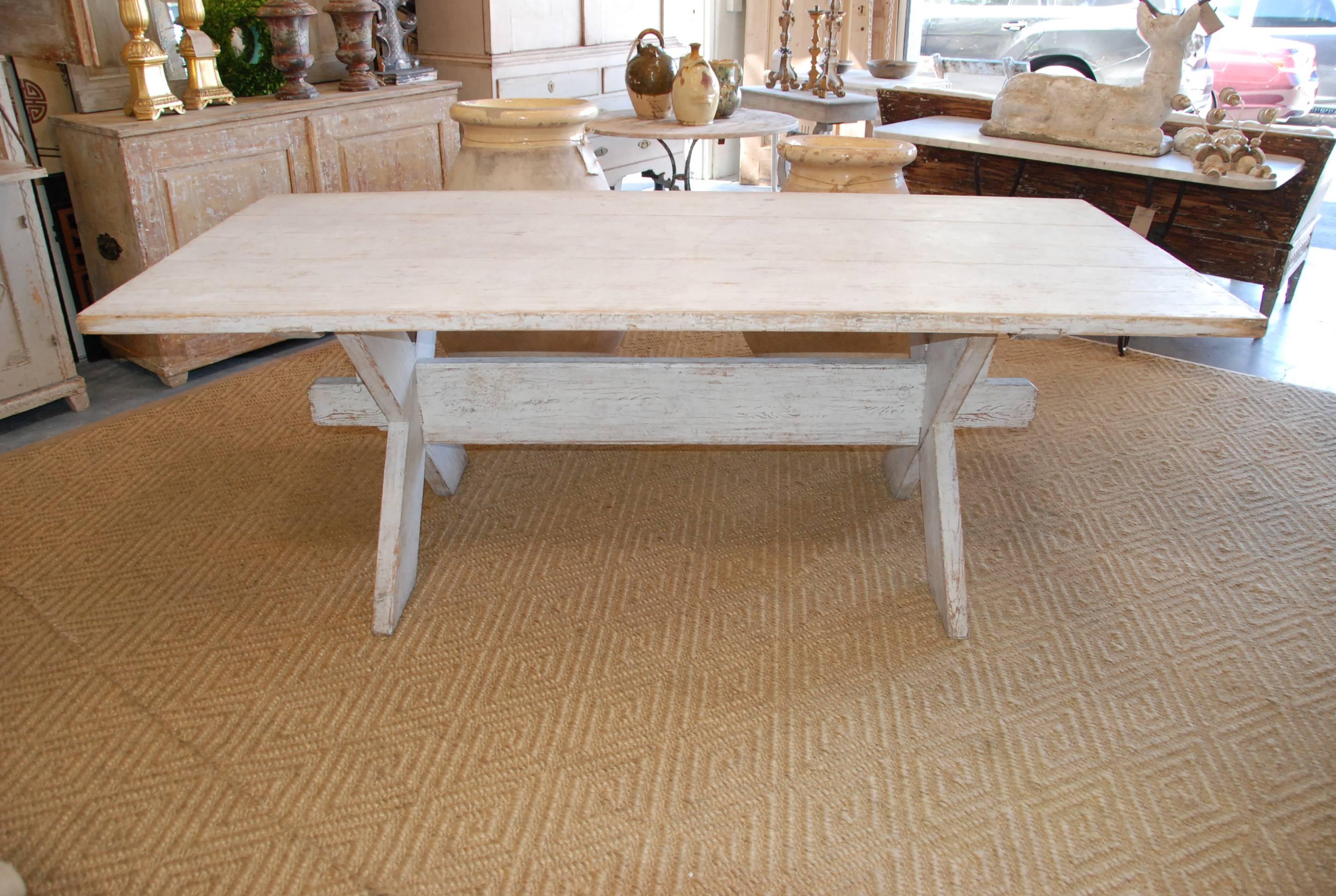 Lovely cream/ white colored 19th century Swedish stretcher farm table. Great size for lots of seating for the holidays.