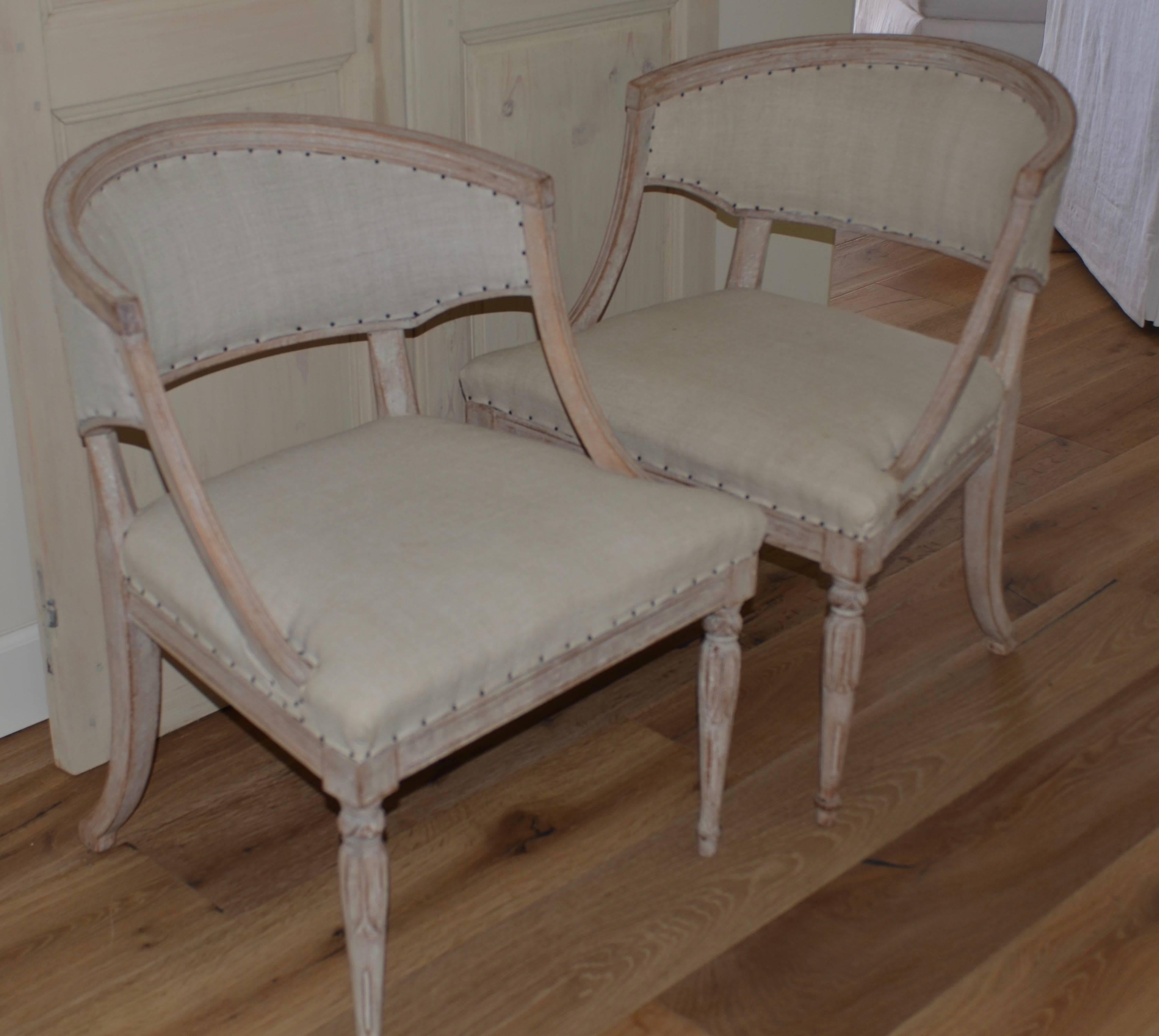 Pair of 19th century Swedish Barrel back chairs fully restored. Lovely cream white color, upholstered in antique Swedish Hemp.