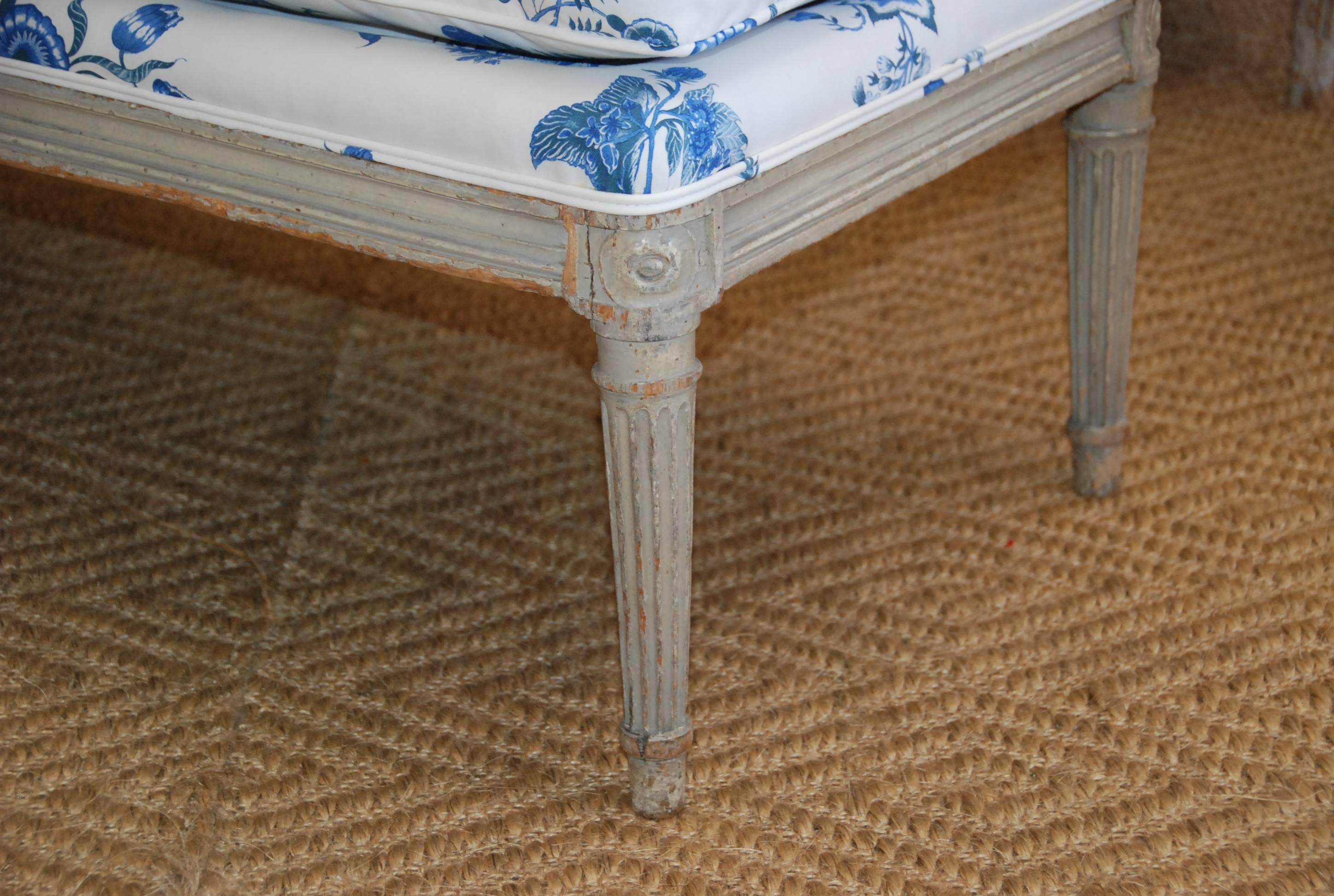 18th century French painted chaise newly upholstered in lovely blue and white Brunschwig and Fils crisp cotton. Original pale French blue/green color, Paris, France.