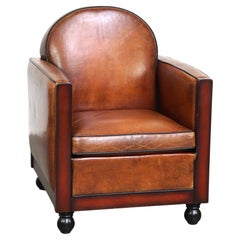 Sheepskin Art Deco design armchair finished with wood and cognac-colored leather
