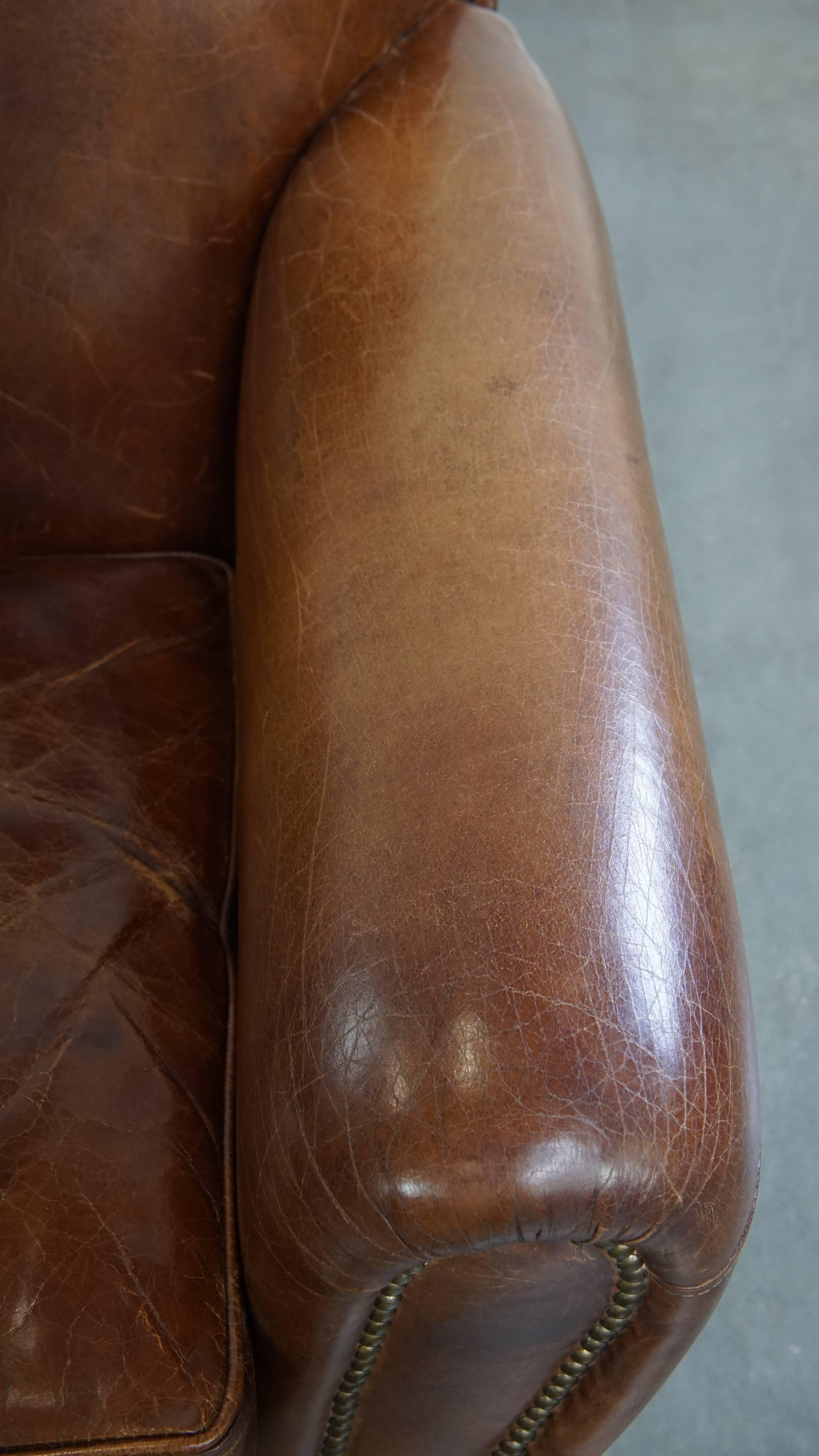Fauteuil en cuir de vachette aux formes arrondies en vente 1