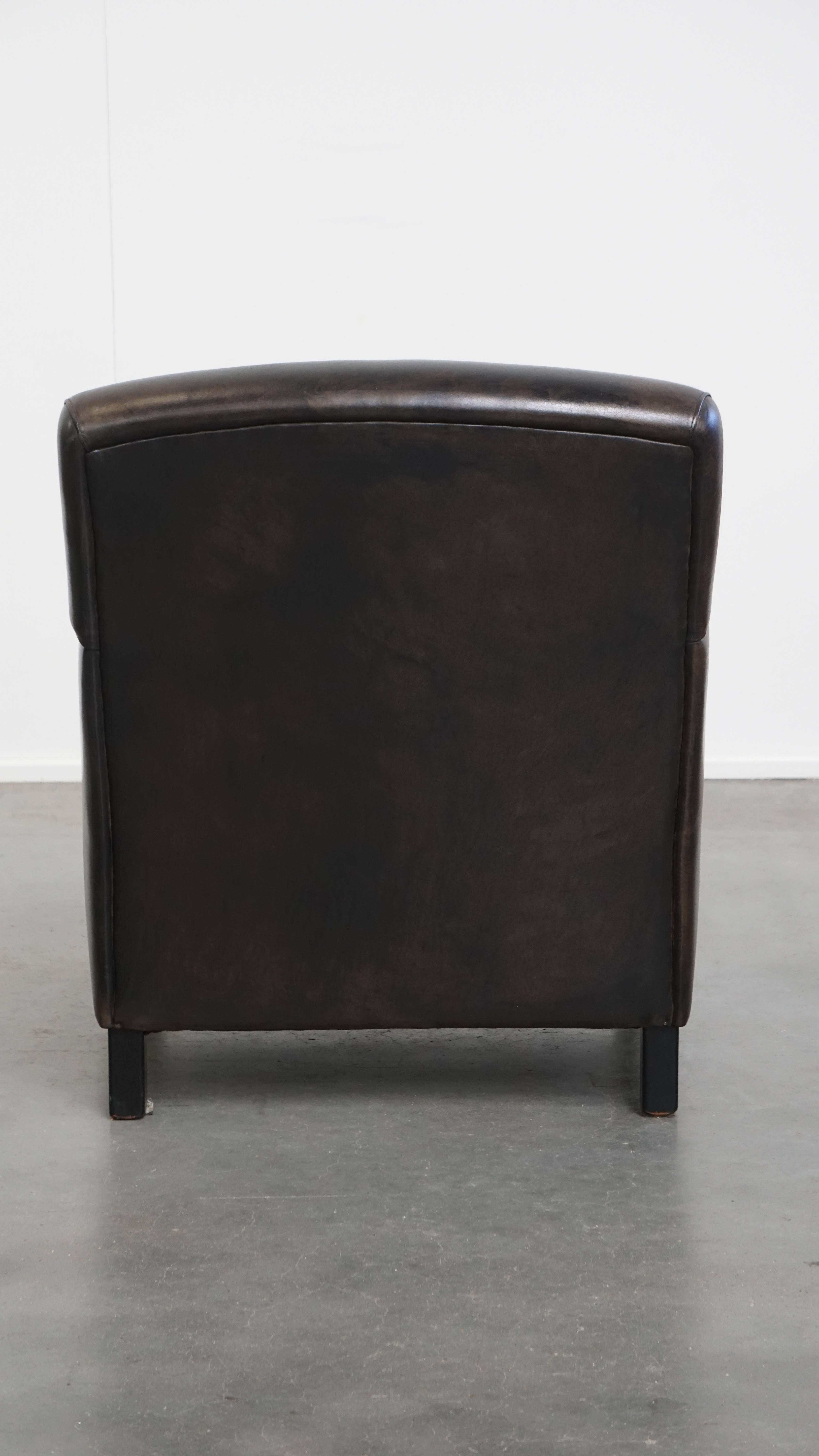 Fait main Fauteuil design noir/gris en cuir de mouton en vente