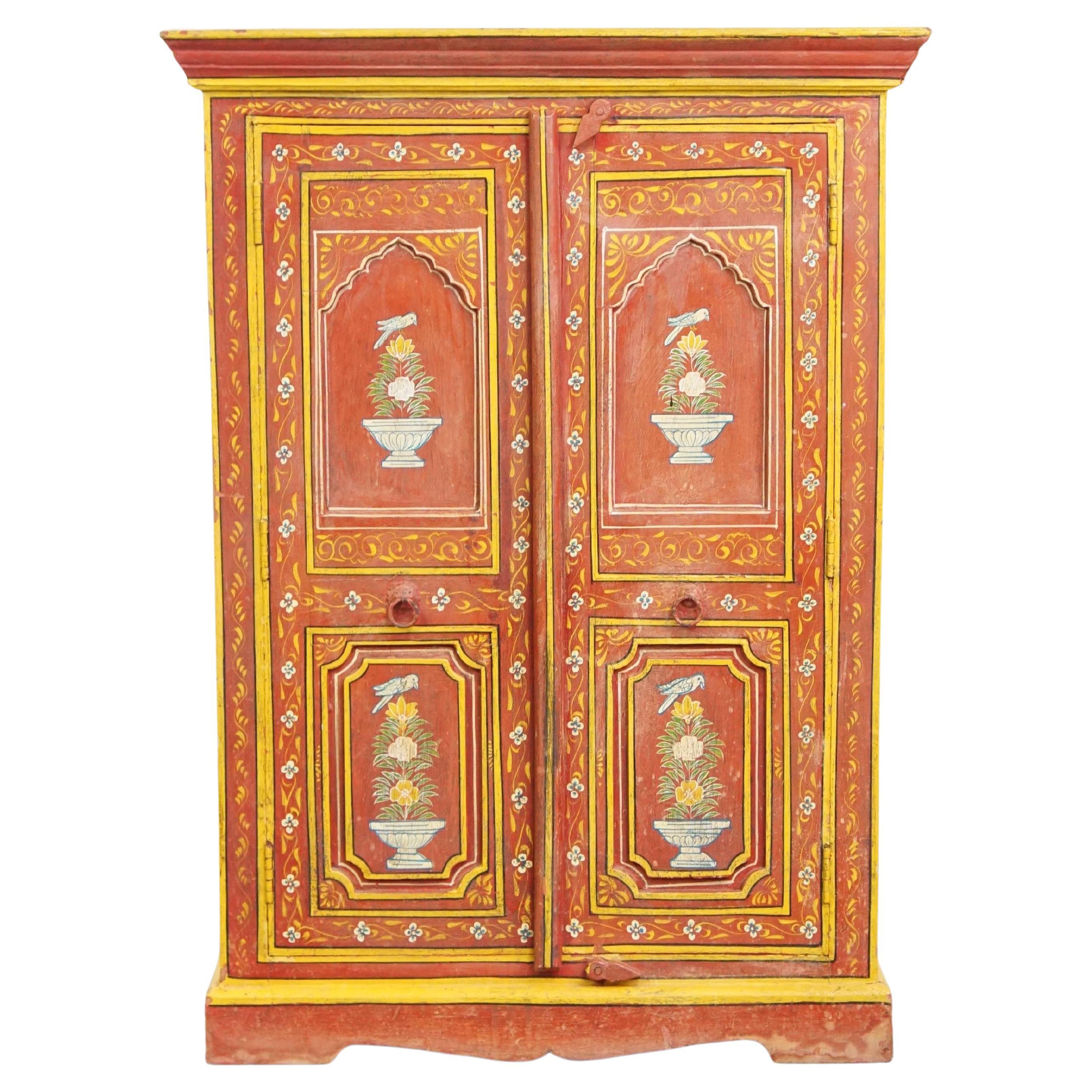 Folk art painted antique cabinet