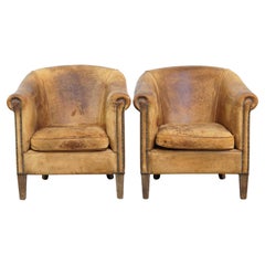 Ensemble de 2 fauteuils club vintage en cuir de mouton