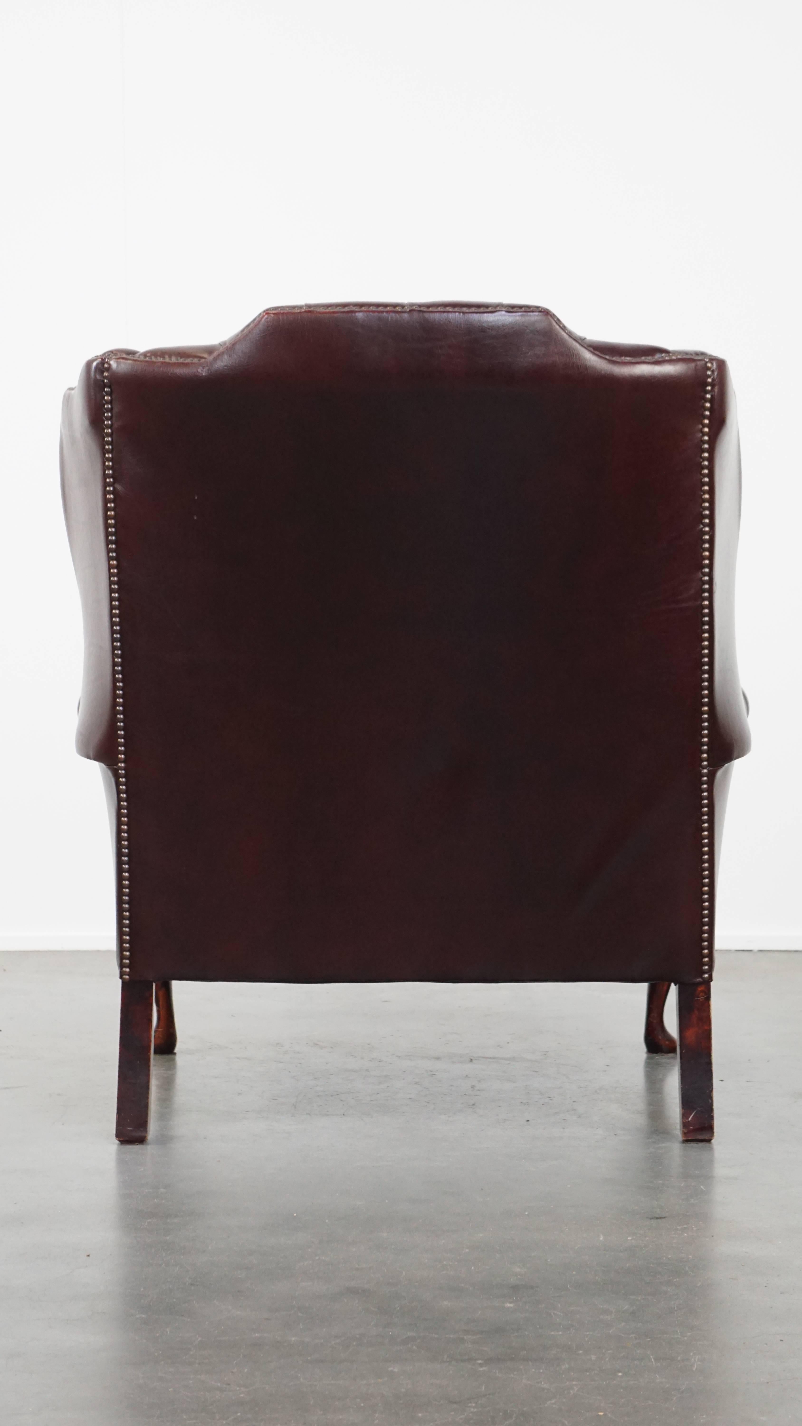 Englischer Chesterfield Ohrensessel aus rotem Rindsleder im Zustand „Gut“ im Angebot in Harderwijk, NL