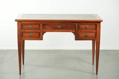 Elegant English style desk with green leather top, gold details and drawers