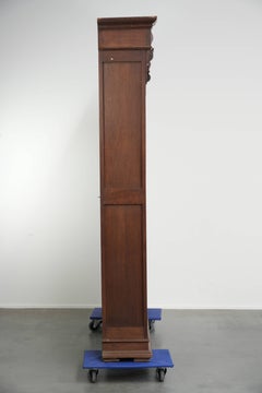 Antique Dutch oak bookcase from the early 20th century with elegant details