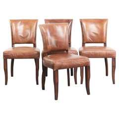 Set di 4 sedie da pranzo in pelle di vacchetta color cognac con borchie decorative