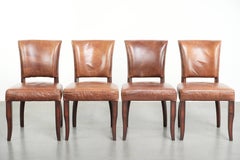 Set di 4 sedie da pranzo in pelle di vacchetta color cognac con borchie decorative