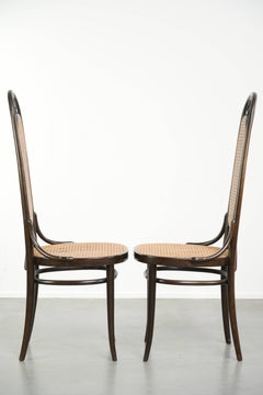 Lot de 2 chaises de salle à manger vintage originales de style Thonet, avec assise en sangle et structure en bois courbé