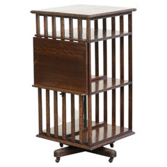 Large antique English oak book carousel from the 19th century