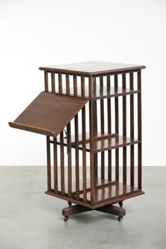 Large antique English oak book carousel from the 19th century