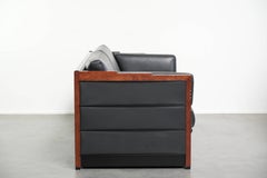 3-seater black cow leather sofa in timeless Art Deco design