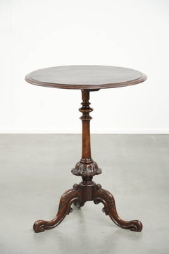 Round antique side table / wine table with rich carvings