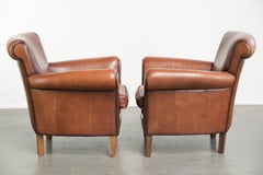 Set of 2 comfortable sheepskin armchairs with a timeless look