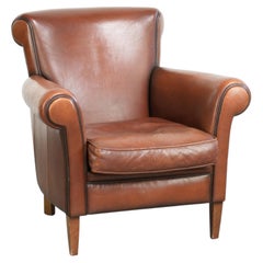 Timeless armchair made of sheepskin leather with a English look