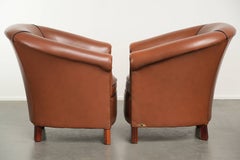 Set of 2 cow leather club armchairs in good condition in English style