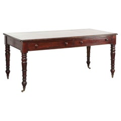 Antique English writing desk from the late 19th century with a warm colour