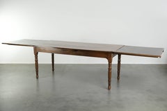 Antique oak dining table from the late 18th century with extendable leaves