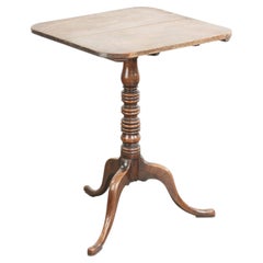 Antique English oak tilt top table from the 19th century in a unique shape