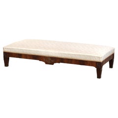Antique French sofa from the 19th century in Empire style with a silk seat