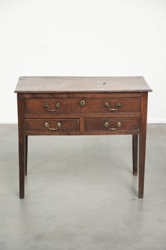 Antique English lowboy side table from the 18th century made of oak