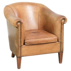 Fauteuil club confortable en peau de mouton, couleur cognac