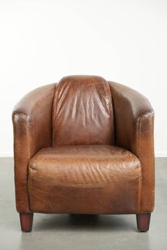 Cow leather Aviator design armchair in a cognac colour