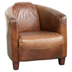 Cow leather Aviator design armchair in a cognac colour