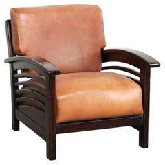 Elegant cowhide armchair with beautiful details in timeless Art Deco design