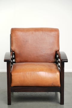 Elegant cowhide armchair with beautiful details in timeless Art Deco design