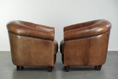 Set of 2 sheepskin club chairs in a timeless English style