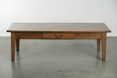 Antique French coffee table made of walnut with a beautiful patina