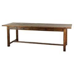 Large antique farmhouse dining table from the 19th century made of pinewood