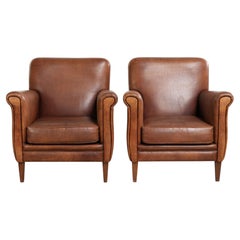 Comfortable set of sheepskin armchairs with and a timeless design