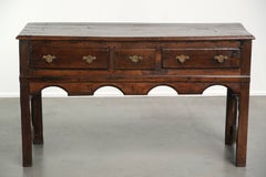 English dresser from the early 18th century made of oak with patina