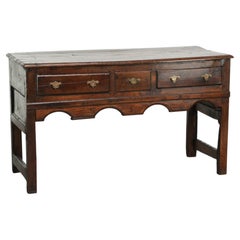 English dresser from the early 18th century made of oak with patina