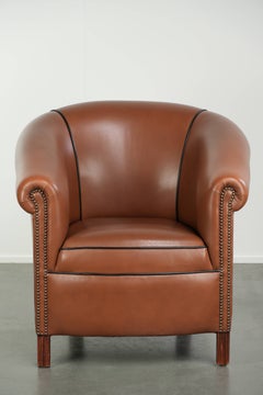 Sillón tipo club de piel de vaca inglesa con un acabado lujoso y un aspecto estupendo