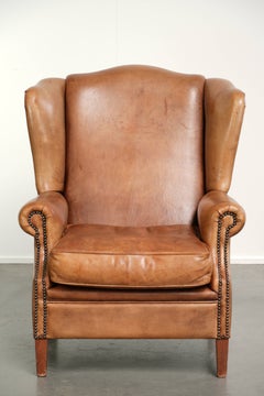 Sessel mit Flügellehnen aus Schafsleder in hellem Cognac-Farbton im englischen Stil