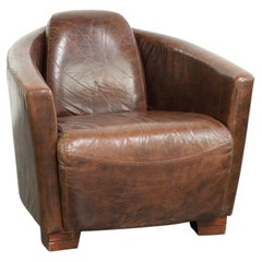 Cow leather armchair in Aviator design with patina and a warm appearance