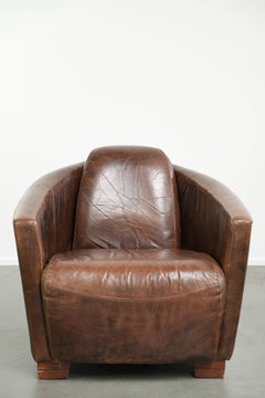 Cow leather armchair in Aviator design with patina and a warm appearance