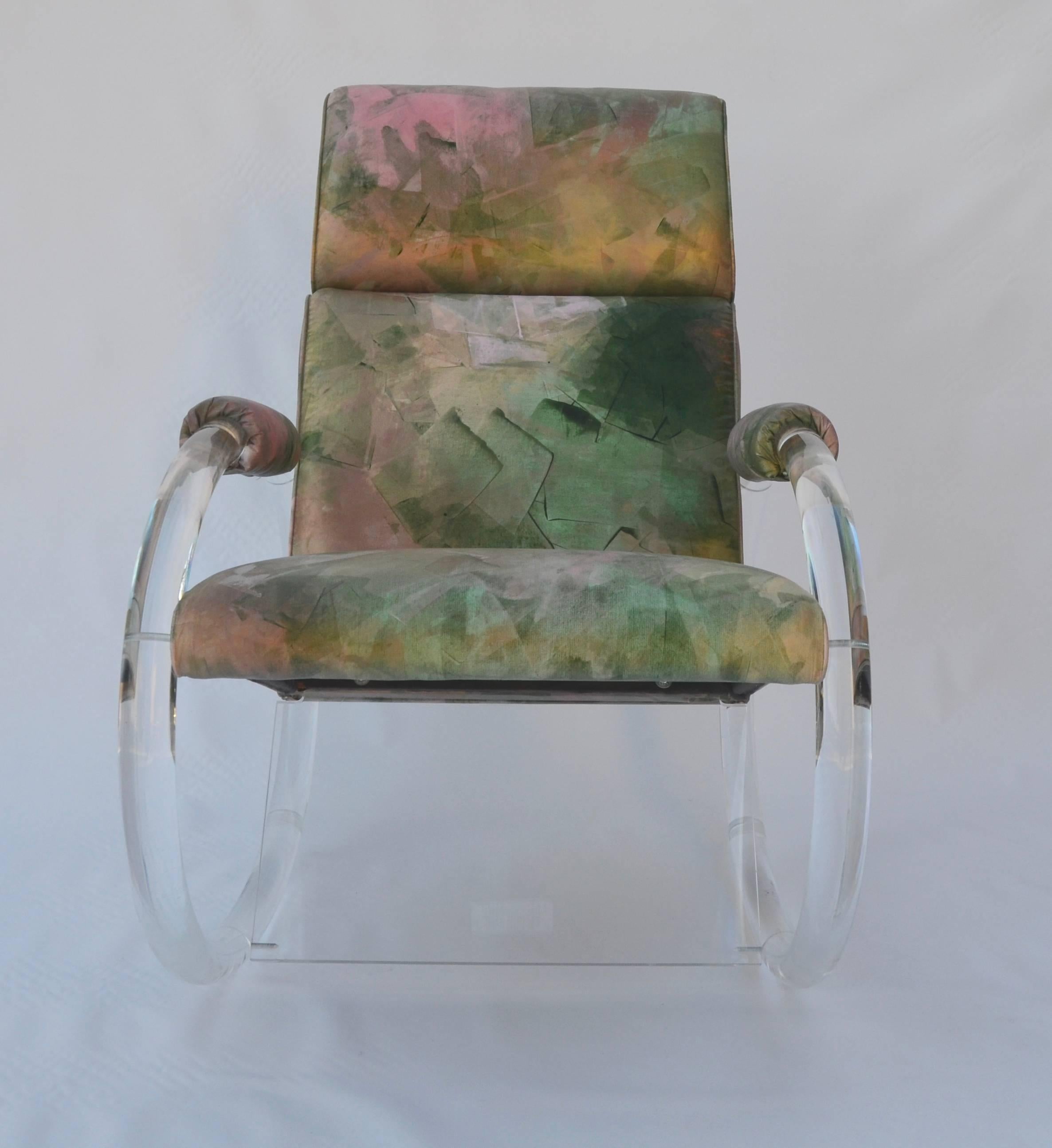Lucite rocking chair by Charles Hollis Jones in the original upholstery. This rocker is in superb condition for it's age. I do not think the original owner really used this piece. Could be reupholstered or if you like the watercolor effect vinyl