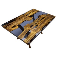Table de salle à manger sur mesure en bois d'olivier, résine époxy bleue