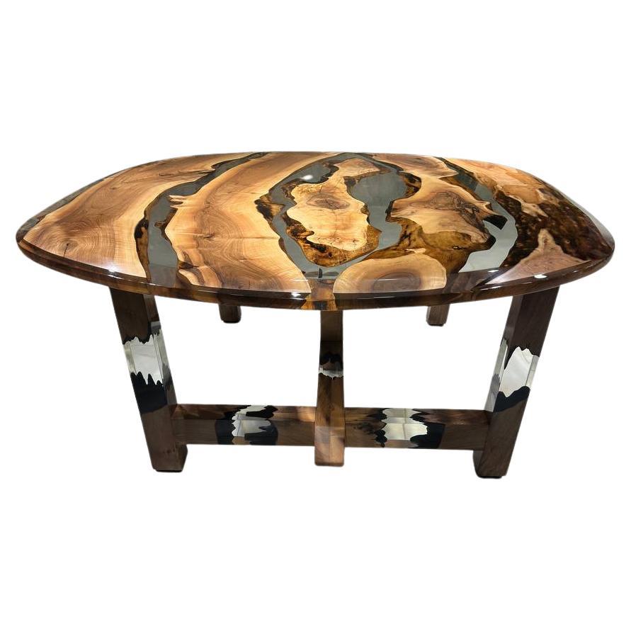 Tavolo in noce con resina epossidica ultra trasparente


Questo splendido tavolo è realizzato in legno di Wood Wood mediterraneo. La bellezza unica delle curve naturali del legno d'ulivo combinate con l'epossidica blu è visibile in questo