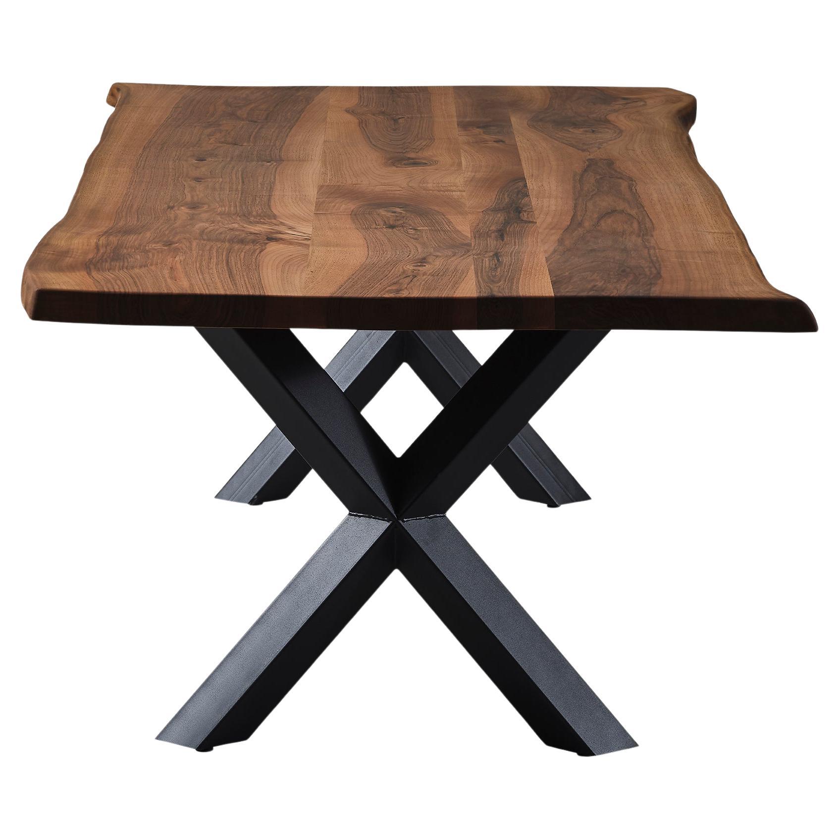 Custom Walnut Live Edge Dining Wood Table 

This table is made of Walnut Wood. The grains and texture of the wood describe what a natural walnut woods looks like.
It can be used as a dining table or as a conference table. Suitable for indoor